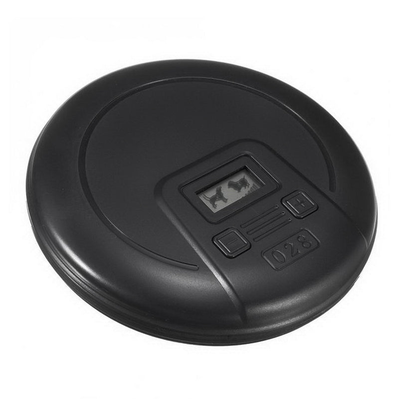 Black, circular control system with LCD screen, plus and minus buttons for distance control.