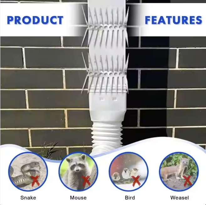White stainless steel anti-bird spikes attached to a downpipe against a black brick wall, shown vertically.