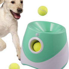 eDog Automatic Ball Launcher with tennis balls and a Labrador puppy