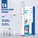 White electric dental plaque remover set with mirror, three metal tips, tool, and product box in background.