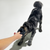 Pet owner holding the Strong Durable Cage Ball, demonstrating its large size and easy-to-grip design for interactive play with dogs - alternate view