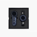 Boxed set with one dark blue remote (three icon buttons) and one round blue collar on a black strap.
