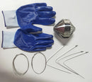 A pair of blue work gloves, a metal spike device, two wire coils, and four white cable ties on a white surface.