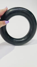 Close-up of the Strong Rubber Ring's textured surface, ideal for promoting dental health and massaging gums during play