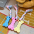 Interactive dog chew toy in 3 colors Blue, Yellow, & Pink - alternate view