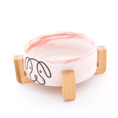 PuppCo Ceramic Dog Bowl Pink Marble on Wooden Stand Side View